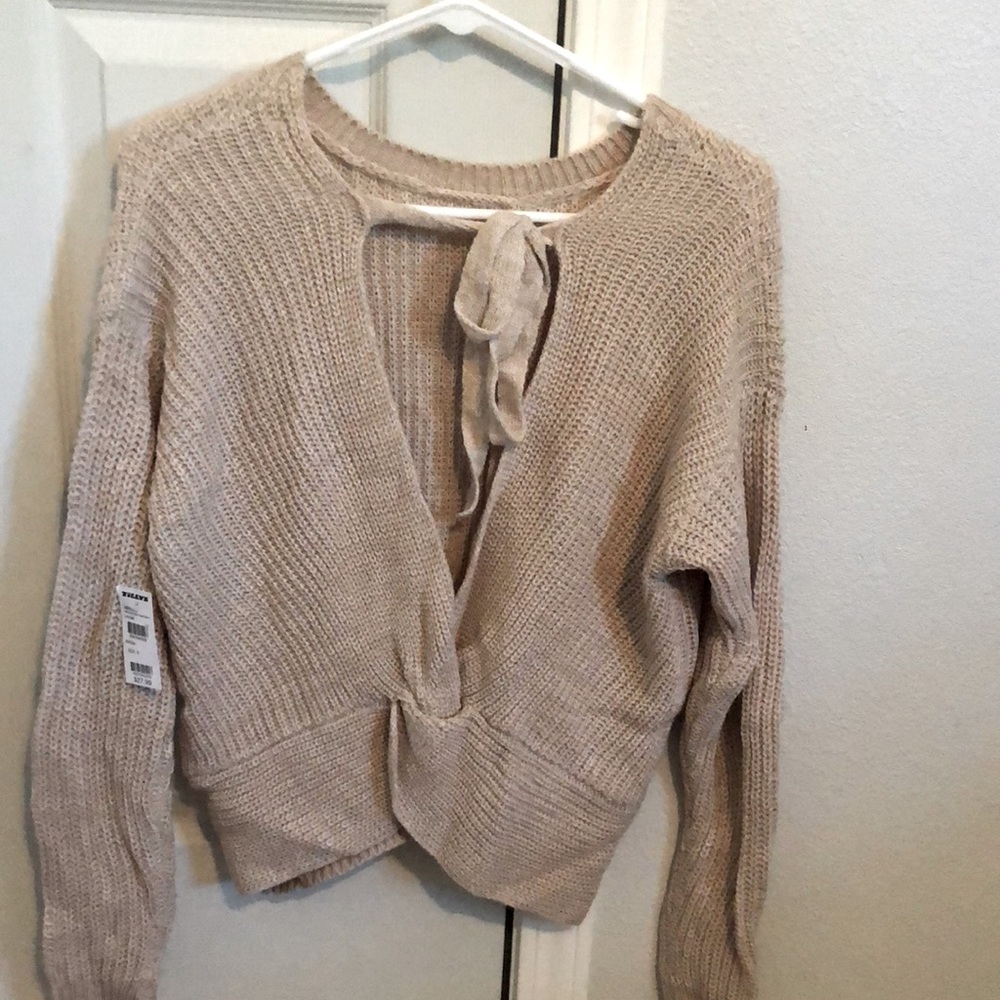 Lightweight sweater.  Open front